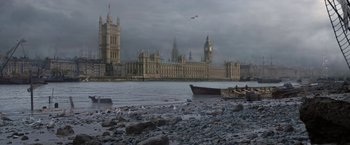 Movie still from “Enola Holmes” (2020), directed by Harry Bradbeer – A view of a river with a castle in the background; Extreme Wide shot, High angle