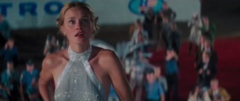 Movie still from “King Kong” (1976), directed by John Guillermin – A person wearing a white dress; Close Up shot, Low angle