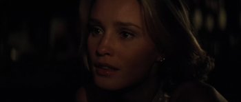 Movie still from “King Kong” (1976), directed by John Guillermin – A woman's face in the dark; Close Up shot, Over the shoulder angle