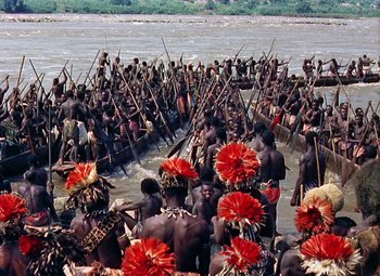 Movie still from “King Solomon's Mines” (1950), directed by Andrew Marton – A group of people on a body of water; Extreme Wide shot, High angle
