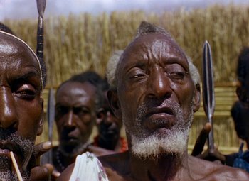 Movie still from “King Solomon's Mines” (1950), directed by Andrew Marton – An old man with white beard and white hair; Close Up shot, Low angle