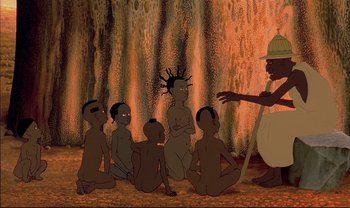 Movie still from “Kirikou and the Sorceress” (1998), directed by Raymond Burlet – A group of people sitting on the ground; Wide shot, High angle