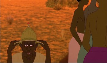 Movie still from “Kirikou and the Sorceress” (1998), directed by Raymond Burlet – An animated scene of a man and a woman in the desert; Medium shot, Over the shoulder angle