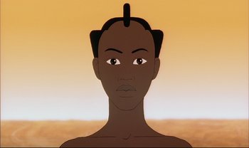 Movie still from “Kirikou and the Sorceress” (1998), directed by Raymond Burlet – An animated face of a woman with a black hair style; Close Up shot, Low angle