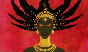 Movie still from “Kirikou and the Sorceress” (1998), directed by Raymond Burlet – An african woman wearing a headdress and a necklace; Close Up shot, Low angle