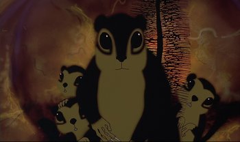 Movie still from “Kirikou and the Sorceress” (1998), directed by Raymond Burlet – An illustration of a squirrel and her babies; Extreme Close Up shot, Low angle