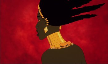 Movie still from “Kirikou and the Sorceress” (1998), directed by Raymond Burlet – An african woman with a long necklace and a large gold necklace; Close Up shot, Low angle
