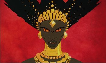 Movie still from “Kirikou and the Sorceress” (1998), directed by Raymond Burlet – An illustration of an african woman wearing a gold headpiece; Close Up shot, Low angle