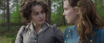 Movie still from “Enola Holmes 2” (2022), directed by Harry Bradbeer – A woman and a young girl talking to each other; Close Up shot, Over the shoulder angle