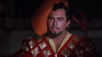 Movie still from “Kiss Me Kate” (1953), directed by George Sidney – A person with a beard; Close Up shot, Over the shoulder angle