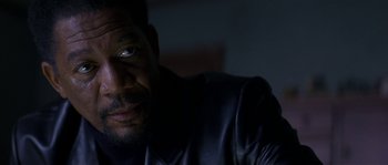 Movie still from “Kiss the Girls” (1997), directed by Gary Fleder – A person wearing a black shirt; Close Up shot, Over the shoulder angle