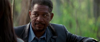 Movie still from “Kiss the Girls” (1997), directed by Gary Fleder – An older man wearing a leather jacket looking to his left; Close Up shot, Over the shoulder angle