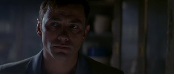 Movie still from “Kiss the Girls” (1997), directed by Gary Fleder – A person looking at the camera; Close Up shot, Low angle