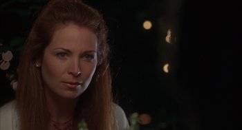 Movie still from “Kissing Jessica Stein” (2001), directed by Charles Herman-Wurmfeld – A person wearing a white shirt; Close Up shot, Over the shoulder angle