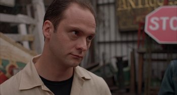 Movie still from “Kissing Jessica Stein” (2001), directed by Charles Herman-Wurmfeld – A person wearing a jacket; Close Up shot, Low angle