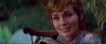 Movie still from “Klute” (1971), directed by Alan J. Pakula – A woman's face in a chair; Close Up shot, Over the shoulder angle