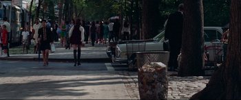 Movie still from “Klute” (1971), directed by Alan J. Pakula – A crowd of people walking down a street; Wide shot, High angle