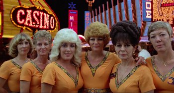 A group of women dressed up in costumes for a show