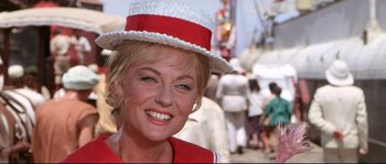 Movie still from “Krakatoa: East of Java” (1968), directed by Bernard L. Kowalski – A person wearing a hat; Close Up shot, Low angle