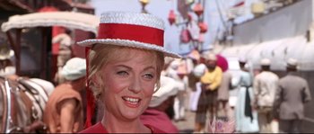 Movie still from “Krakatoa: East of Java” (1968), directed by Bernard L. Kowalski – A person wearing a hat; Close Up shot, Low angle