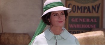 Movie still from “Krakatoa: East of Java” (1968), directed by Bernard L. Kowalski – A person wearing a hat; Close Up shot, Low angle