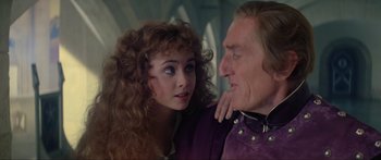 Movie still from “Krull” (1983), directed by Peter Yates – A man and a woman looking at one another; Close Up shot, Over the shoulder angle