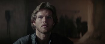 Movie still from “Krull” (1983), directed by Peter Yates – A person with long hair; Close Up shot, Over the shoulder angle