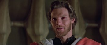 Movie still from “Krull” (1983), directed by Peter Yates – A person with a red eye; Close Up shot, Over the shoulder angle