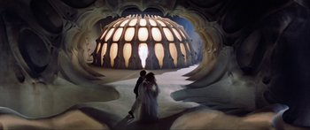 Movie still from “Krull” (1983), directed by Peter Yates – Two people standing in front of an illuminated building; Extreme Wide shot, High angle