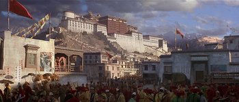 Movie still from “Kundun” (1997), directed by Martin Scorsese – A group of people standing in front of a building; Extreme Wide shot, High angle