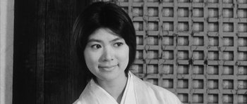 Movie still from “Black Cat” (1968), directed by Kaneto Shindô – Black and white photograph of a woman in a kimono; Close Up shot, Low angle