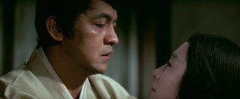 Movie still from “Kwaidan” (1964), directed by Masaki Kobayashi – A man and a woman face to face; Close Up shot, Low angle