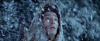 Movie still from “Kwaidan” (1964), directed by Masaki Kobayashi – A man with a beard is wearing a hood; Close Up shot, Low angle