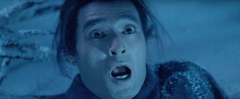 Movie still from “Kwaidan” (1964), directed by Masaki Kobayashi – A man's face as he stares into the camera; Close Up shot, Overhead angle