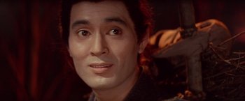 Movie still from “Kwaidan” (1964), directed by Masaki Kobayashi – A man's face in a room; Close Up shot, Over the shoulder angle