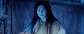Movie still from “Kwaidan” (1964), directed by Masaki Kobayashi – A woman with long black hair wearing a white robe; Close Up shot, Low angle