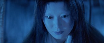 Movie still from “Kwaidan” (1964), directed by Masaki Kobayashi – A woman's face in the dark; Close Up shot, Low angle