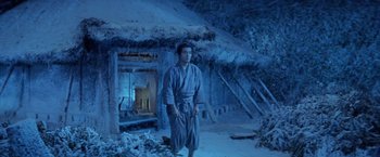 Movie still from “Kwaidan” (1964), directed by Masaki Kobayashi – A man standing in the middle of a snow covered field; Wide shot, Low angle