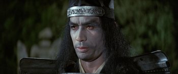 Movie still from “Kwaidan” (1964), directed by Masaki Kobayashi – A person with long black hair; Close Up shot, Over the shoulder angle