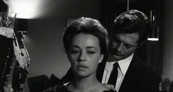 Movie still from “La Notte” (1961), directed by Michelangelo Antonioni – A man and a woman in black and white photo; Close Up shot, Low angle