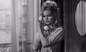 Movie still from “The Truth” (1960), directed by Henri-Georges Clouzot – A woman holding a phone up to her ear; Close Up shot, High angle