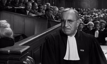 Movie still from “The Truth” (1960), directed by Henri-Georges Clouzot – An old man in a court room wearing a judge's robe; Close Up shot, Over the shoulder angle