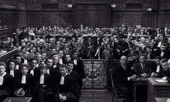 Movie still from “The Truth” (1960), directed by Henri-Georges Clouzot – A group of people sitting in front of an audience; Extreme Wide shot, High angle
