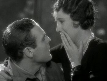 Movie still from “Ladies of Leisure” (1930), directed by Frank Capra – A man and a woman looking at each other; Close Up shot, High angle