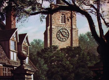 Movie still from “Lassie Come Home” (1943), directed by Fred M. Wilcox – A large clock tower in the middle of a forest; Extreme Wide shot, Low angle