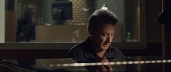 Movie still from “Last Chance Harvey” (2008), directed by Joel Hopkins – A man sitting in front of a piano in a room; Close Up shot, Over the shoulder angle