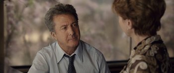 Movie still from “Last Chance Harvey” (2008), directed by Joel Hopkins – An older man wearing a blue tie and a white shirt; Close Up shot, Over the shoulder angle