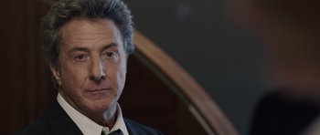 Movie still from “Last Chance Harvey” (2008), directed by Joel Hopkins – A person wearing a suit and tie; Close Up shot, Low angle