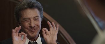 Movie still from “Last Chance Harvey” (2008), directed by Joel Hopkins – A person smiling and waving; Close Up shot, Low angle