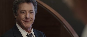 Movie still from “Last Chance Harvey” (2008), directed by Joel Hopkins – A person wearing a suit and tie; Close Up shot, Over the shoulder angle
